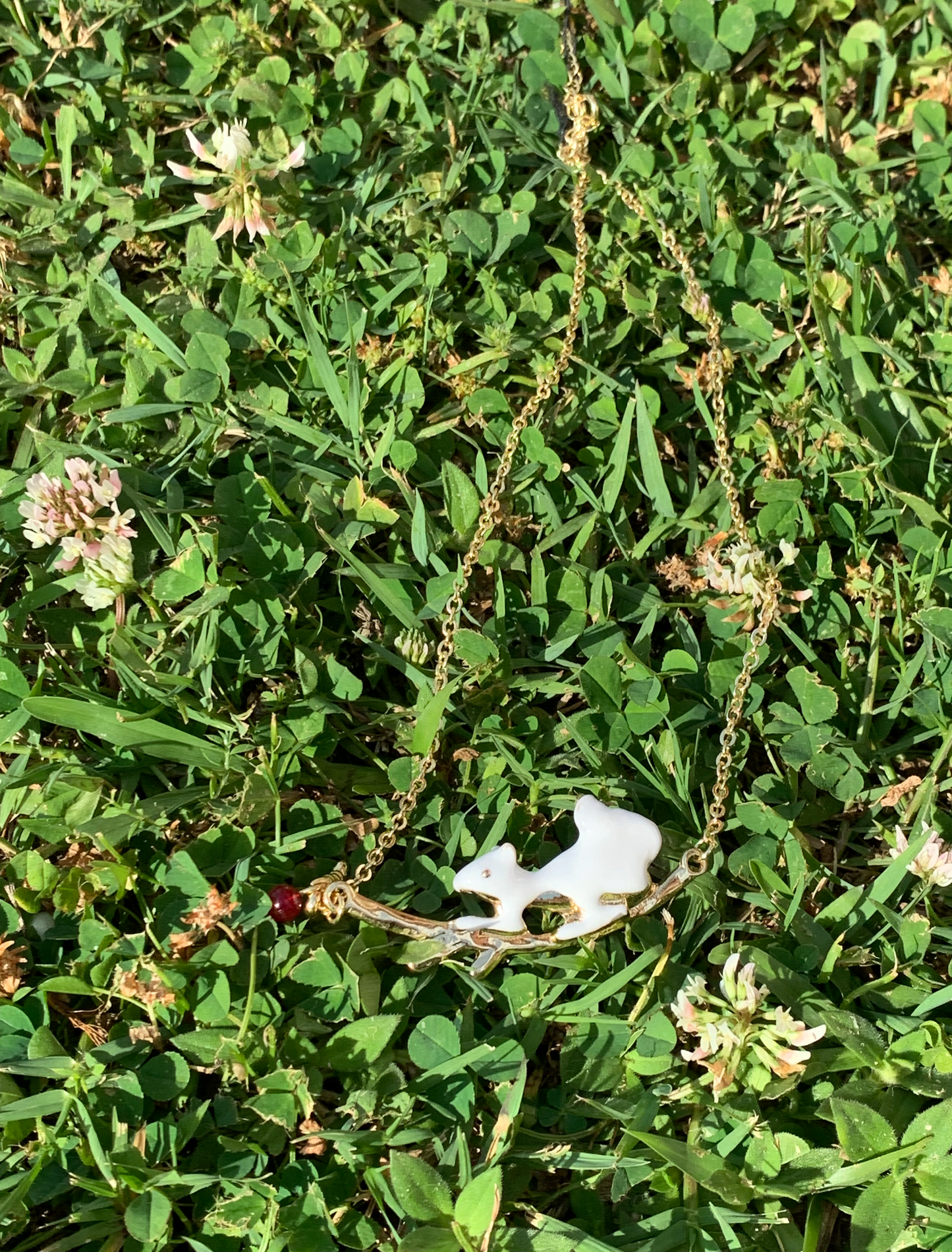 White Squirrel Chasing Nut Necklace
